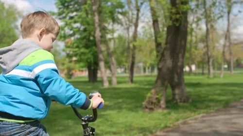 Learning to Ride Bike in Park