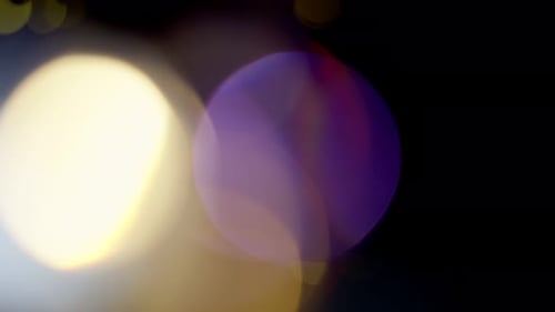 Multicolored Light Leaks Footage on Black Background Stylizing Video Transitions Bokeh Effect