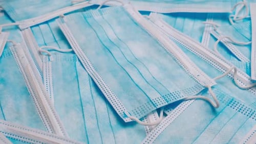 Close Up of Disposable Light Blue Face Masks