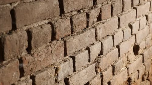 Close Up of Rough Earth Toned Brick Wall
