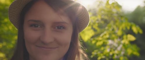 Smiling Young Woman in Hat Close Up
