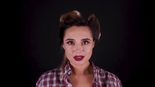 Woman with Hair Rollers Opening Eyes