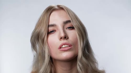 Aggressive Pretty Crazy Girl Looking at Camera Face Sight Close Up Background