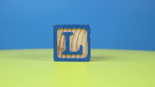 Close up shot letter "L" alphabet wooden block
