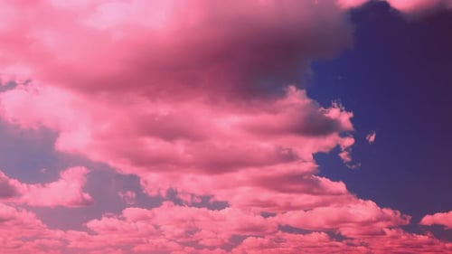 Pink Clouds Drifting Across a Deep Blue Sky