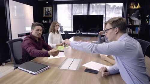 Business Meeting in Modern Urban Office