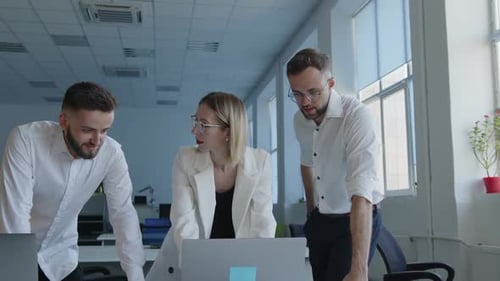 Team of professionals working together at the office