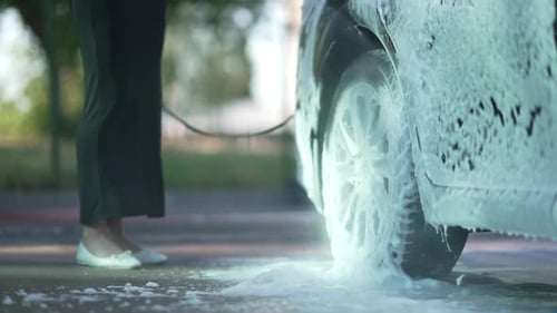 Car Covered with Sudsy Foam During Washing