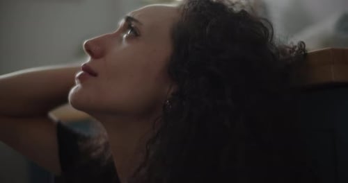 Very emotional woman in the bathroom