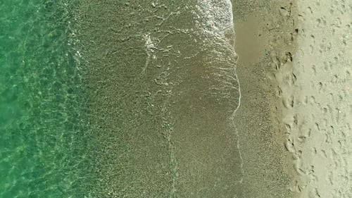 Aerial View Calm Clear Sea and Sunny Beach