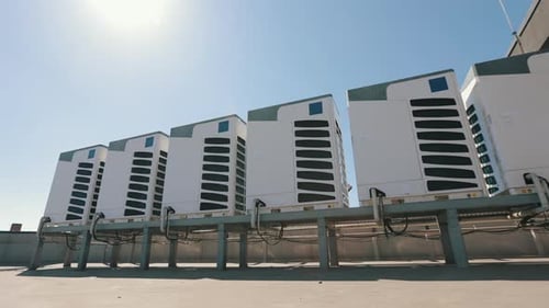 An Air Conditioning System of Six Air Conditioners is Located on the Roof of the Business Center