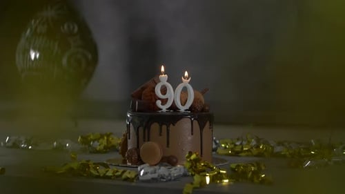 Chocolate Birthday Cake with Candles and Confetti