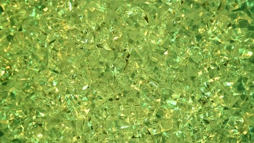 Abstract background of green rhinestones spinning