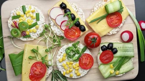 Colorful Rice Cakes with Vegetables and Cheese