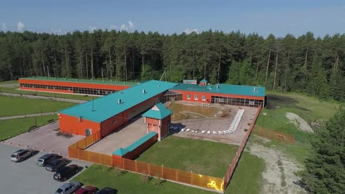 Aerial view of Recreation center with guest rooms and a pool on the street 02