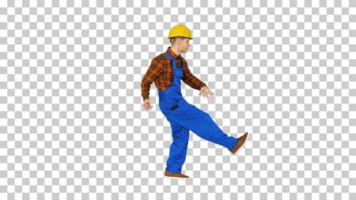 Baile funky de un joven trabajador de la construcción con sombrero de seguridad Alpha