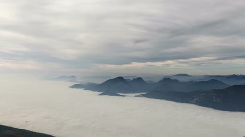 Aerial View of Misty Mountains and Cloud