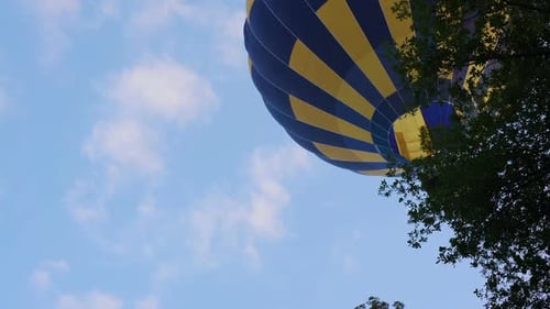 Bottom View of Beautiful Hot Air Balloon Flying Over the Trees, Leisure Activity