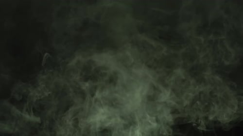 Light Green Smoke Billowing on Black Background