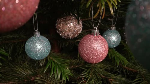 Close Up of Ornate Christmas Tree with Glittering Ornaments