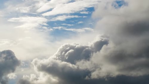 Dramatic Storm Clouds Against Blue Sky
