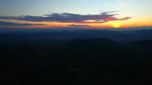 4K Aerial drone of Epic mountain with a colorful sunset