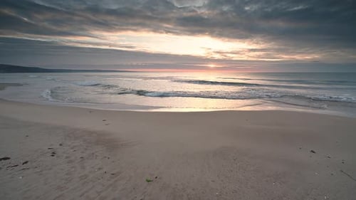 Sandy beach at sunrise