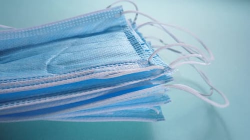 Stack of Blue Medical Face Masks Close Up