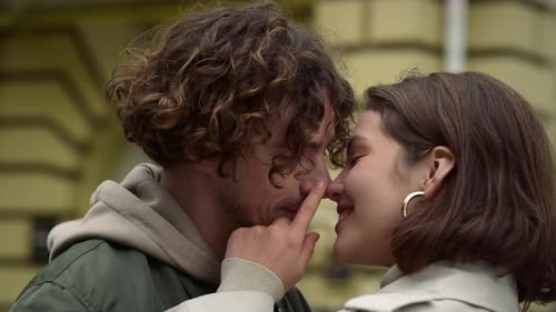 Affectionate Couple Share Sweet Embrace in City