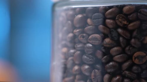 Coffee Beans in a Glass Jar Close Up