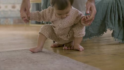 Closeup Shot of Cute Little Baby Crawling on Floor