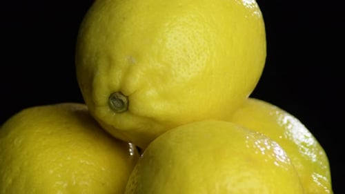 Pile of Vibrant Yellow Lemons Close Up