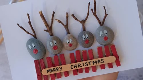 Making Diy Merry Christmas Deer on Greeting Card Postcard Made of Pebbles Sea Stones Clothespins and