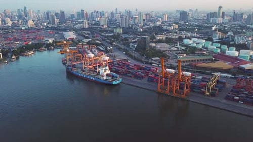 Aerial top view of container cargo ship in the export and import business and logistics
