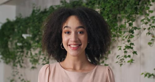 Portrait of Beautiful Young Black Girl African American Woman Teenager with Curly Hairstyle