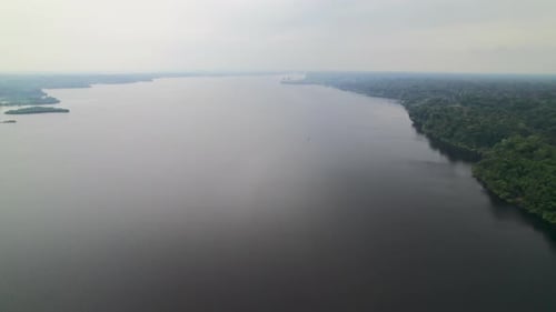 Wide River View through Tropical Rainforest