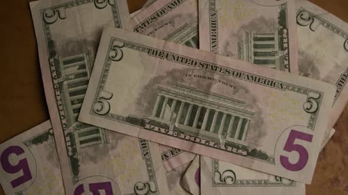 Rotating shot of American money (currency)