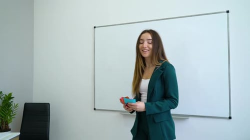 Business Speaker with Cards in Meeting Room