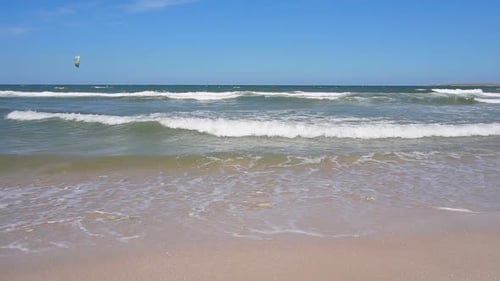 Paradise Beach with Beautiful Sea Waves on a Sandy Beach on a Sunny Day