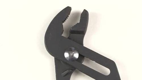 Pipe Tongs on White, Rotation, Close Up
