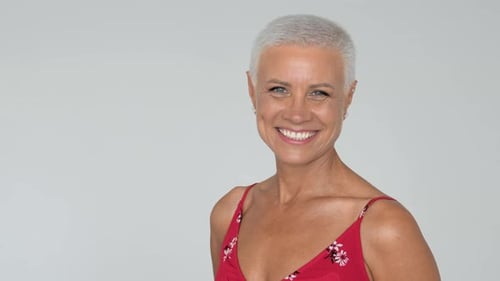 Adult Woman with Short Gray Hair Smiling