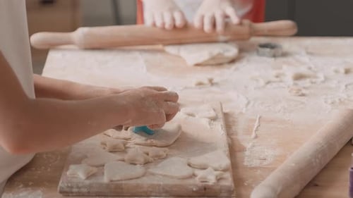 Children Baking Cookies Together at Home