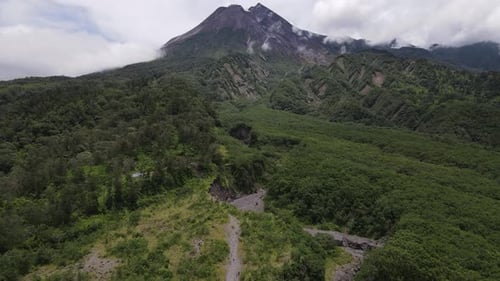 Aerial view of active Merapi mountain with clear sky in Indonesia