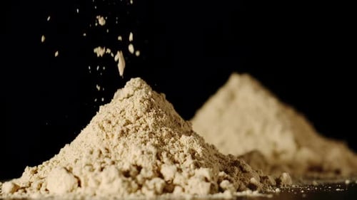 Turmeric Powder Pouring On A Table