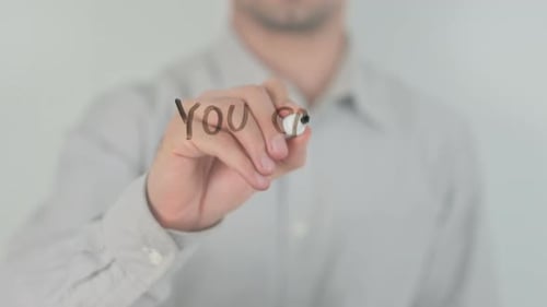 Writing: 'You Can Do Anything' Motivational Message