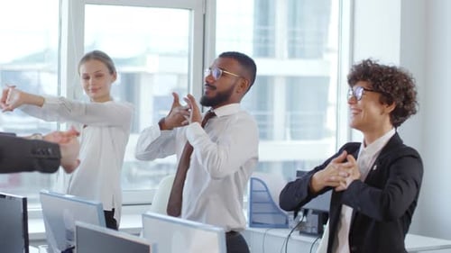 Office Workers Exercising Together