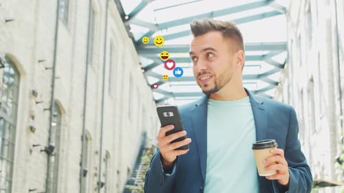 Man Using Smartphone with Animated Emojis
