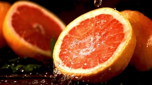 Fresh Grapefruit Close Up with Water Droplets