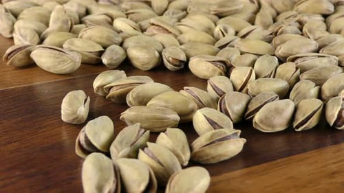 Pistachios Close Up on a Wooden Table