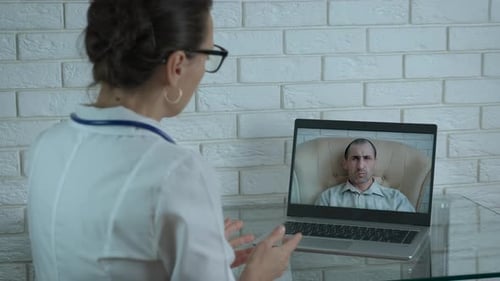 Health Professional Providing Telehealth Appointment With Patient